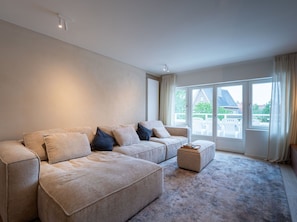 Interior Design, Flooring, Floor, Couch, Ceiling, Wood, Living Room, Wood Flooring, Room, Apartment