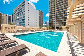 Take a refreshing dip in our sparkling outdoor pool, surrounded by comfortable lounge chairs and shaded cabanas, perfect for soaking up the Hawaiian sun.