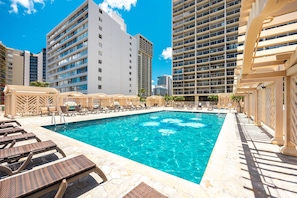 Take a refreshing dip in our sparkling outdoor pool, surrounded by comfortable lounge chairs and shaded cabanas, perfect for soaking up the Hawaiian sun.