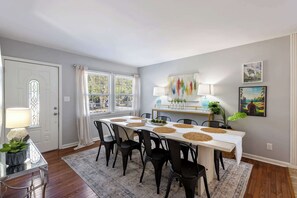 Gather and Dine: Elegant Dining Room with Seating for Eight, Perfect for Family Meals!