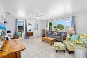 Unit A Living Room - Patio Access, Queen Sleeper Sofa + TV