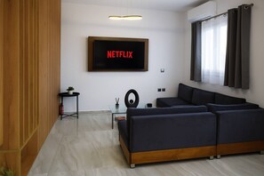 Open-Plan Living Area – Smart layout with dining and lounging space combined.