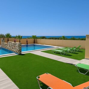 Relax by the pool surrounded by nature and tranquility.