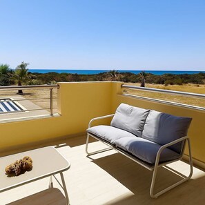 Spacious outdoor seating with breathtaking sea views – perfect for unwinding.