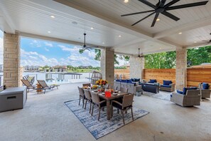 Covered Outdoor Seating Area - Views to Pool and Lake