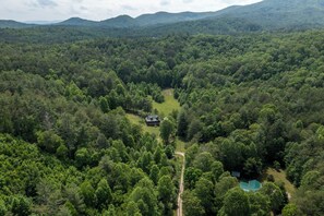 Enjoy staying in an authentic log cabin tucked in a peaceful mountain forest.