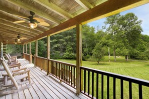 Rock your cares away on the lighted, covered porch. 