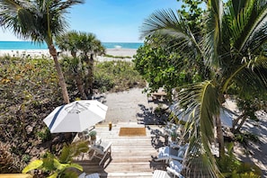 Your own private beach—best enjoyed barefoot in the sand, a cool drink in hand, and nothing but the sound of gentle waves around you