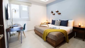 King size master bedroom, with TV and working space