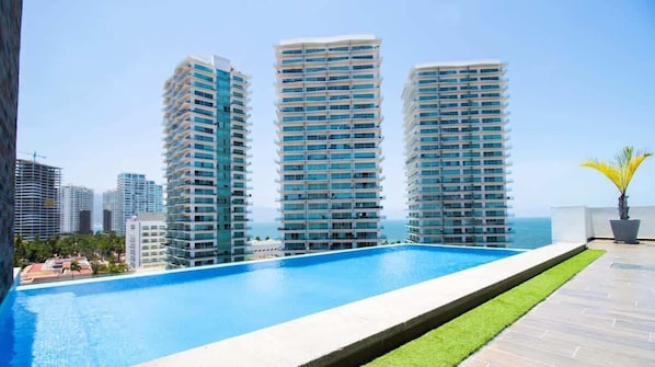Enjoy the refreshing rooftop swimming pool with great views