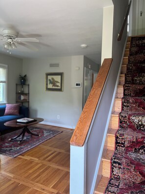 Living area and stairs to second floor (bedrooms and bathroom)