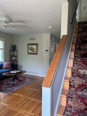 Living area and stairs to second floor (bedrooms and bathroom)