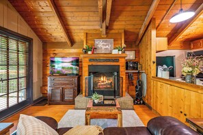 Unwind by the fire and make yourself at home in our inviting living area.