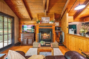 Unwind by the fire and make yourself at home in our inviting living area.