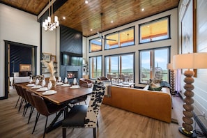 Oakley's Overlook includes a custom live edge dining table allowing everyone to gather and enjoy time together + take in the amazing mountain views