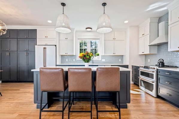 Additional counter seating at the full kitchen