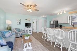 Living room and bar seating - enjoy eating a leisurely breakfast in