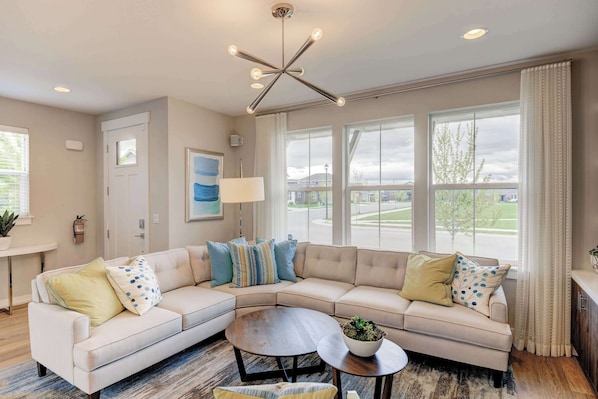 Living Room 1 - Open-concept living and dining area – perfect for relaxing and sharing meals!