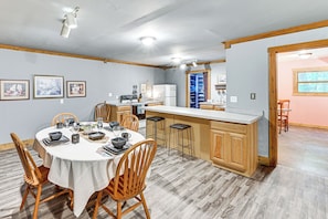 Dining Area | 1st Floor | Dishware/Flatware | Central Heating & A/C