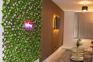 Ascetically pleasing flower wall, perfect to snap a picture to create memories