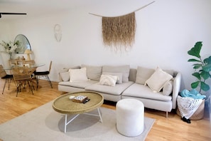 A cozy and stylish living space, perfect for relaxing or entertaining.