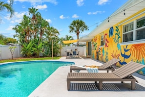 Soak up the sun by the pool all day