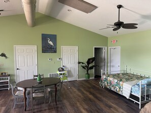 Queen day bed and kinette area
