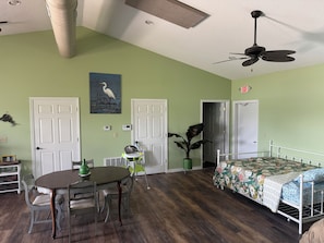 Queen day bed and kinette area