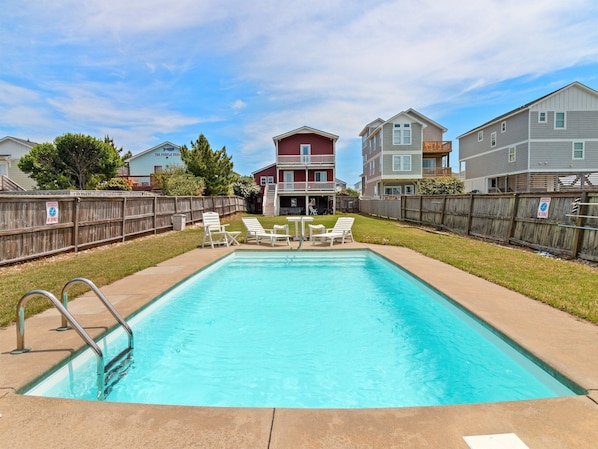You'll love the Private Pool surrounded by lounge chairs and the large fenced yard that's tailor-made for playful pups.