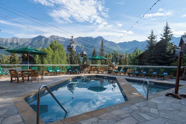 Exterior: Outdoor heated pool, 2 outdoor hot tubs