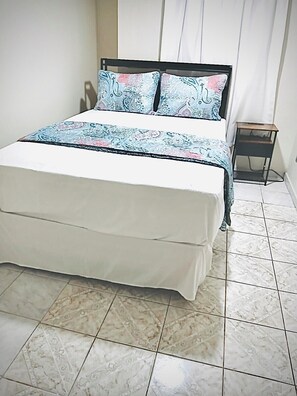 The 2nd BDRM offers a comfortable double bed with cozy linens, ideal for comfort