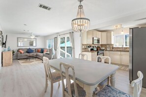 This dining area is located next to the kitchen
