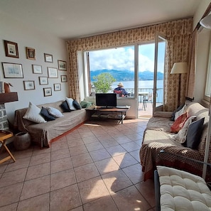 Large window and French door leading to terrace