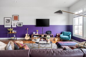 Living area is stylish and comfortable. (Twain)
