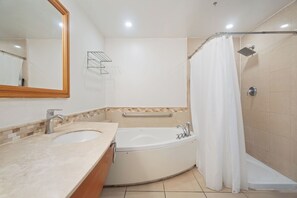 Spacious and elegant, our bathroom offers ample counter space and modern fixtures for your ultimate comfort.