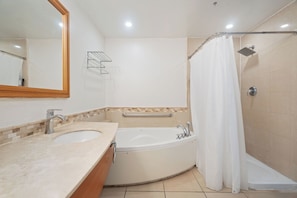 Spacious and elegant, our bathroom offers ample counter space and modern fixtures for your ultimate comfort.