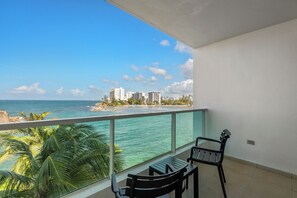 Your private balcony with sweeping ocean views & the vibrant San Juan skyline. Perfect for relaxing and soaking it all in.