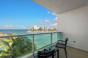 Your private balcony with sweeping ocean views & the vibrant San Juan skyline. Perfect for relaxing and soaking it all in.