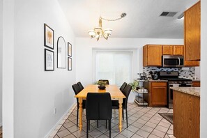 Dining Area leading into Kitchen