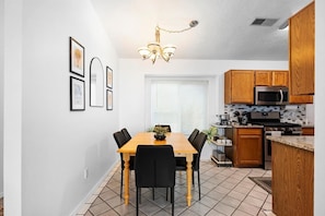 Dining Area leading into Kitchen