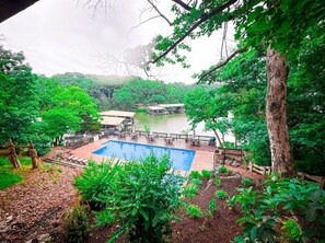 Enjoy direct access to the beautiful lake and community pool at Treetop Village. The perfect setting for swimming, sunbathing, and taking in the serene lake views.