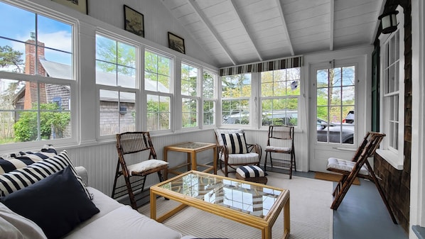 Wonderful sun porch with comfortable seating