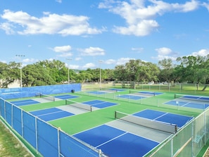 Challenge company to a fun game of pickleball or tennis.