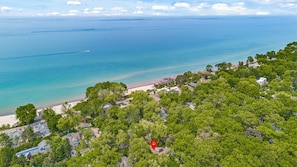 Indulge in coastal elegance just moments from the sand.