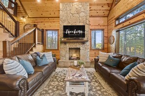 Gather with loved ones in this cozy living space with plenty of natural light.