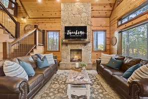 Gather with loved ones in this cozy living space with plenty of natural light.