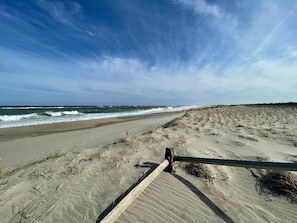 Just a short stroll away—enjoy the serene beauty of Red River Beach, perfect for morning walks or sunset views by the shore.