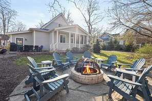 The backyard firepit: where stories are shared and marshmallows are toasted.