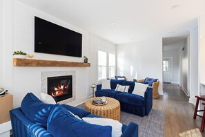 Kick back and enjoy the warmth of the fireplace