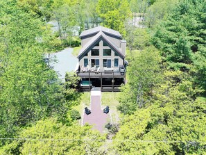 Nestled in nature among trees—perfect backdrop for a mountain vacation.